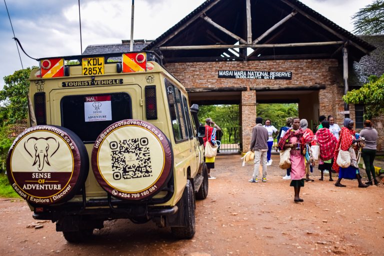 Luxury travelers enjoying a game drive during Private Group Safaris to Kenya in the iconic Maasai Mara National Reserve surrounded by wildlife and scenic savannah landscapes
