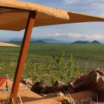 2-Day Masai Mara Safari Package inspired luxury lodge experience in Samburu featuring elegant safari suites overlooking the wilderness.