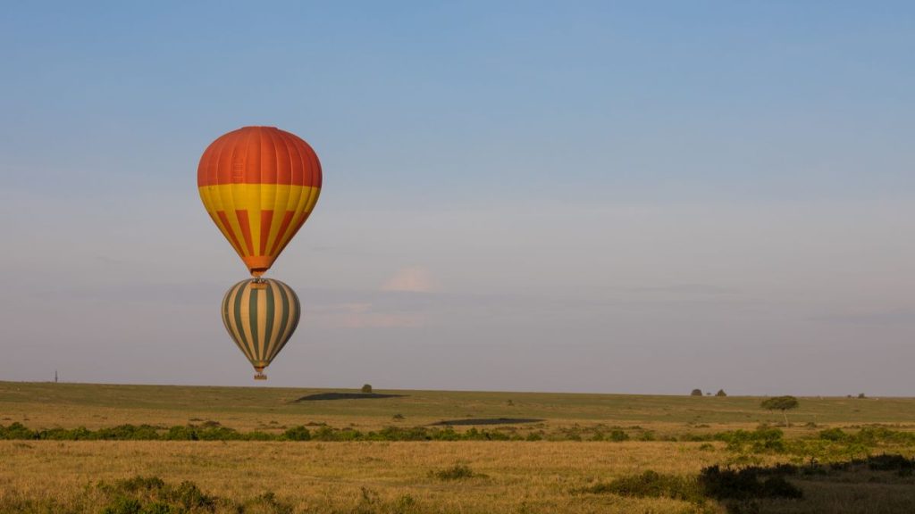 Kenya honeymoon safari hot air balloon over the Masai Mara at sunrise