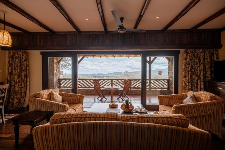Suite lounge and balcony at Kilaguni Serena Safari Lodge overlooking Tsavo West