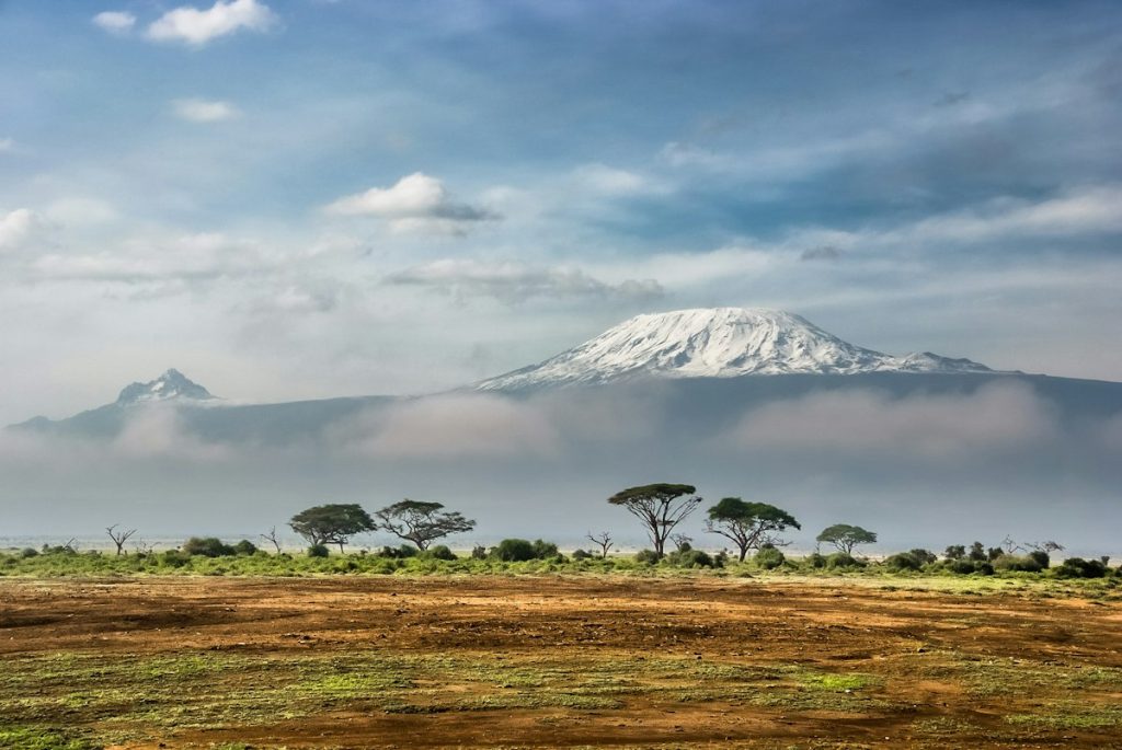 Snow-capped Mount Kilimanjaro above Amboseli on a Kenya safari from Switzerland