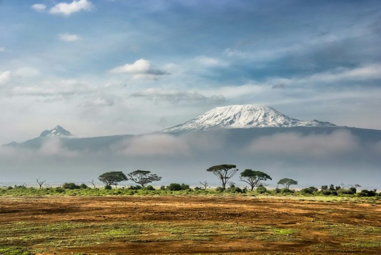 Snow-capped Mount Kilimanjaro above Amboseli on a Kenya safari from Switzerland