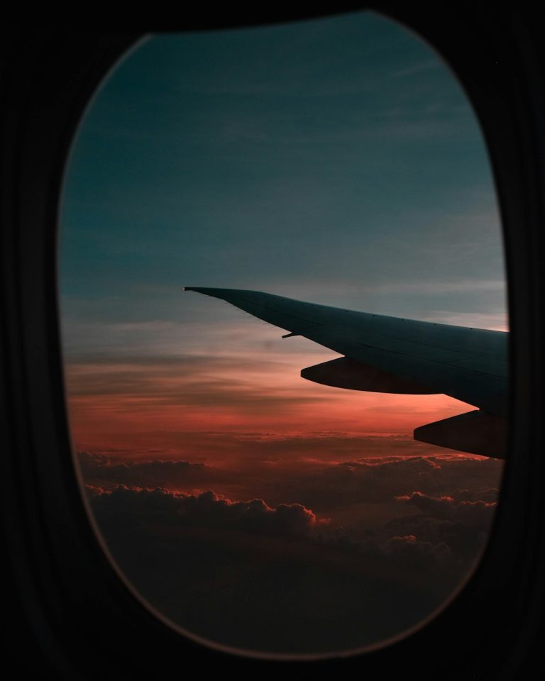 Golden hour view from an aircraft window while working out the layover time to leave JKIA