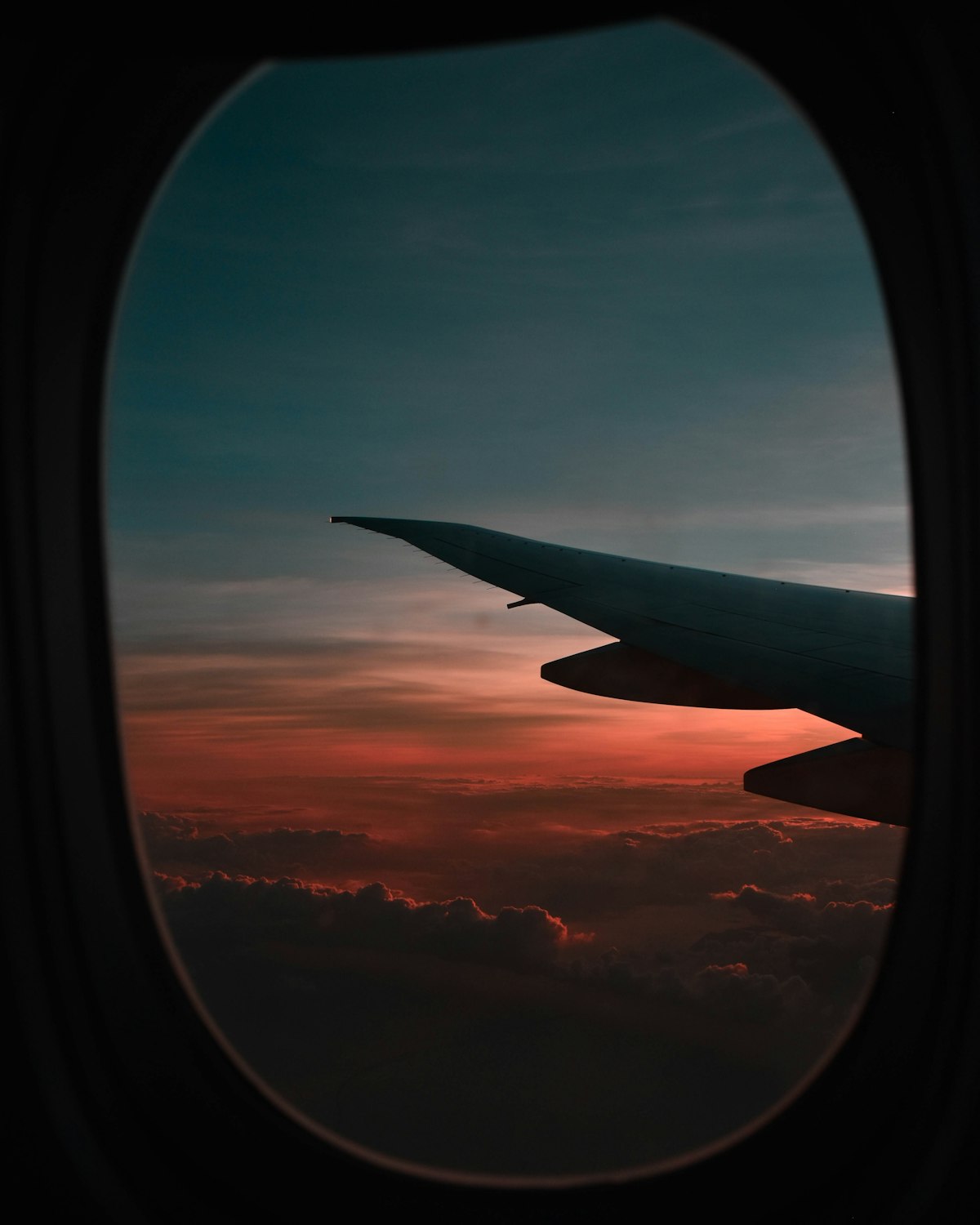 Golden hour view from an aircraft window while working out the layover time to leave JKIA
