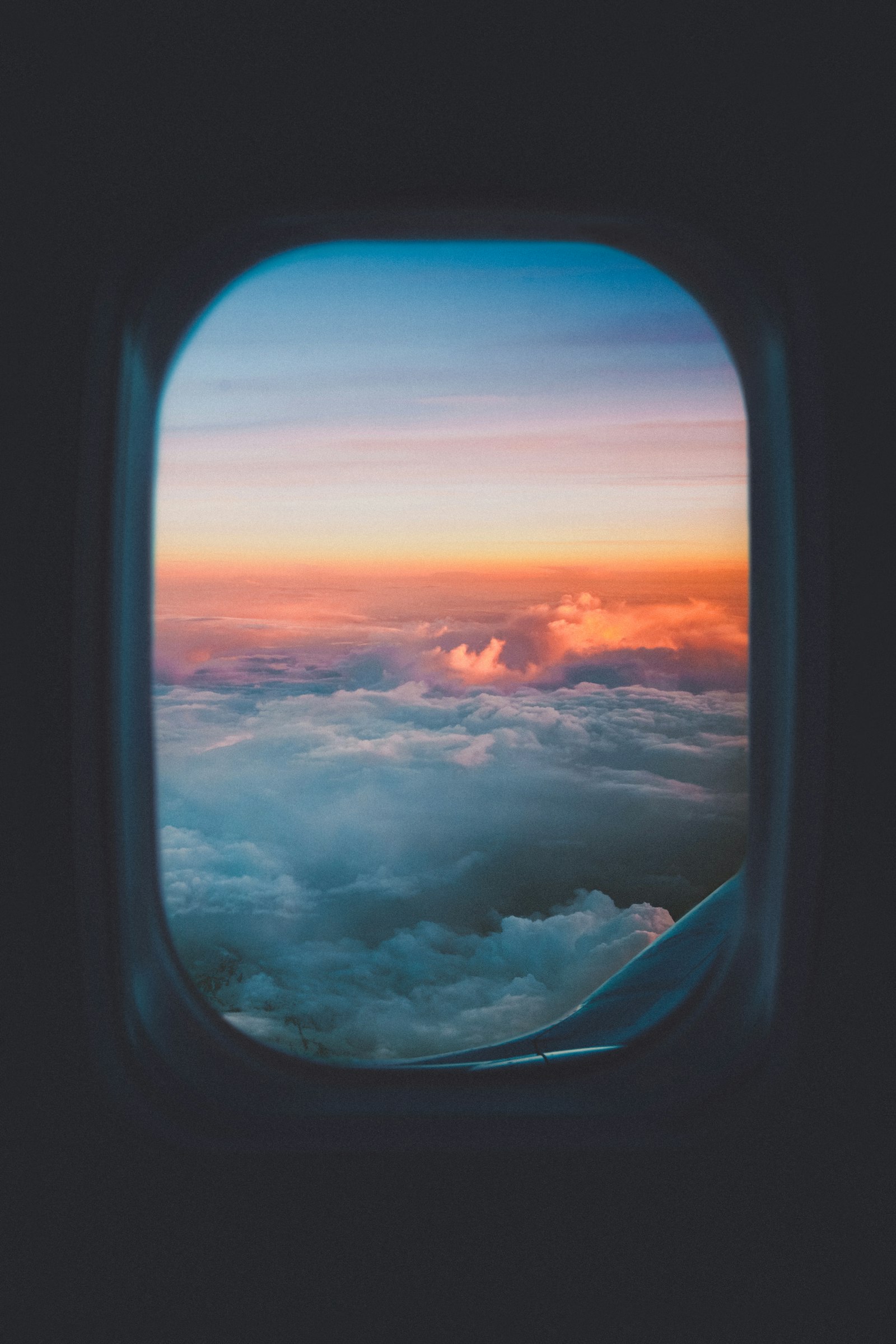 View from an aircraft window over a sea of clouds on the approach to Nairobi