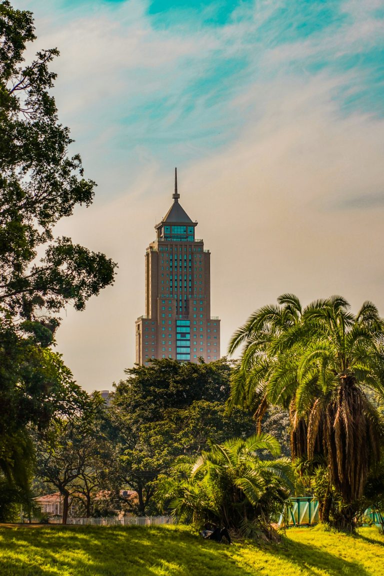 Historic building among green trees in Nairobi, part of a Karen Blixen Museum tour