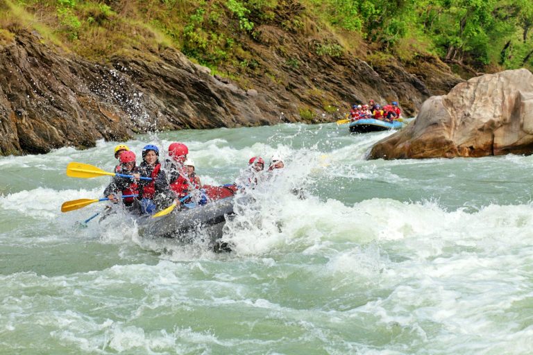 Group rafting down a river, the experience of Sagana white water rafting