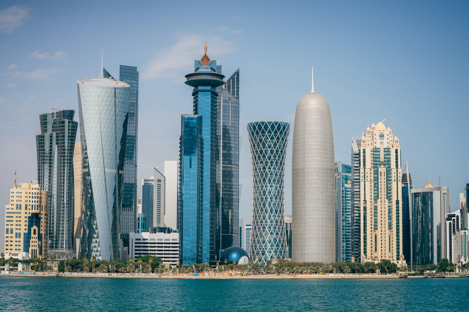 High-rise towers of West Bay rising beside the water in Doha, Qatar, a Gulf transit hub