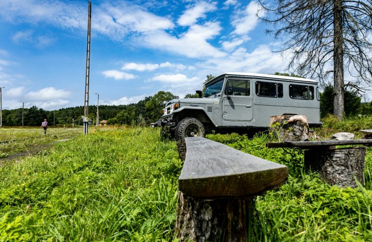 2 days in the Masai Mara: a safari jeep parked on open grassland during a game drive