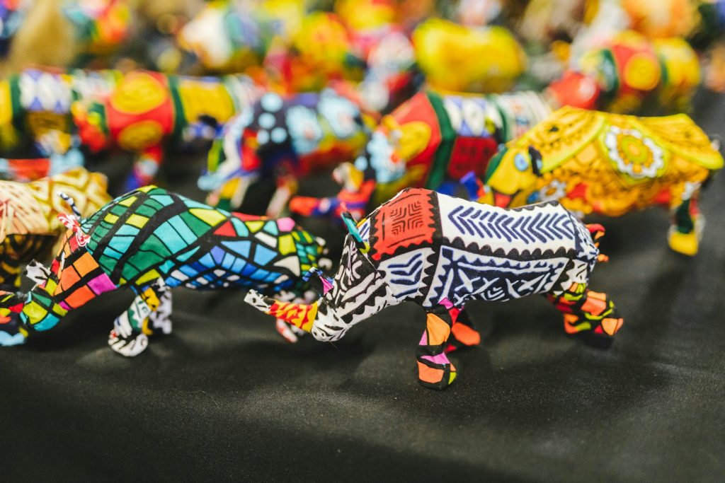 Colourful glass animals and crafts for sale, like those on a Maasai Market Nairobi shopping trip