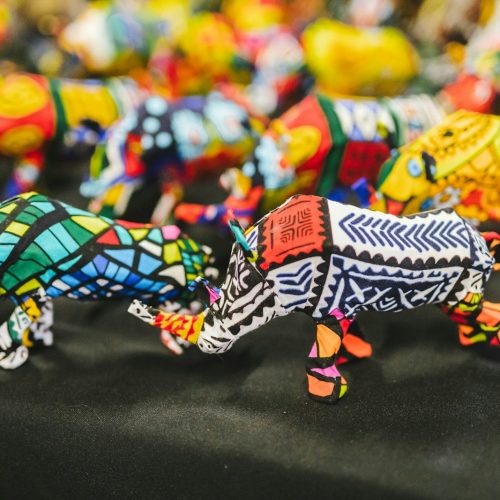 Colourful glass animals and crafts for sale, like those on a Maasai Market Nairobi shopping trip