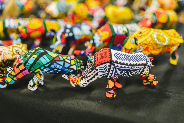 Colourful glass animals and crafts for sale, like those on a Maasai Market Nairobi shopping trip