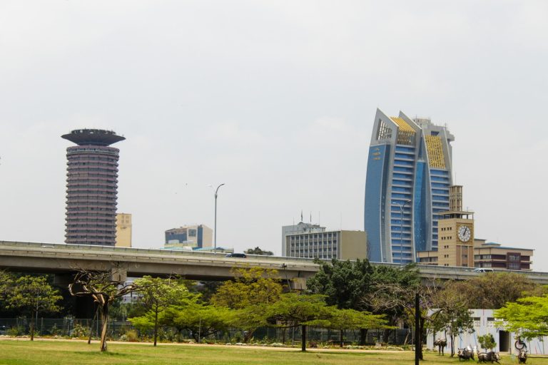 Nairobi stopover view of the city skyline with high-rise towers under a pale sky