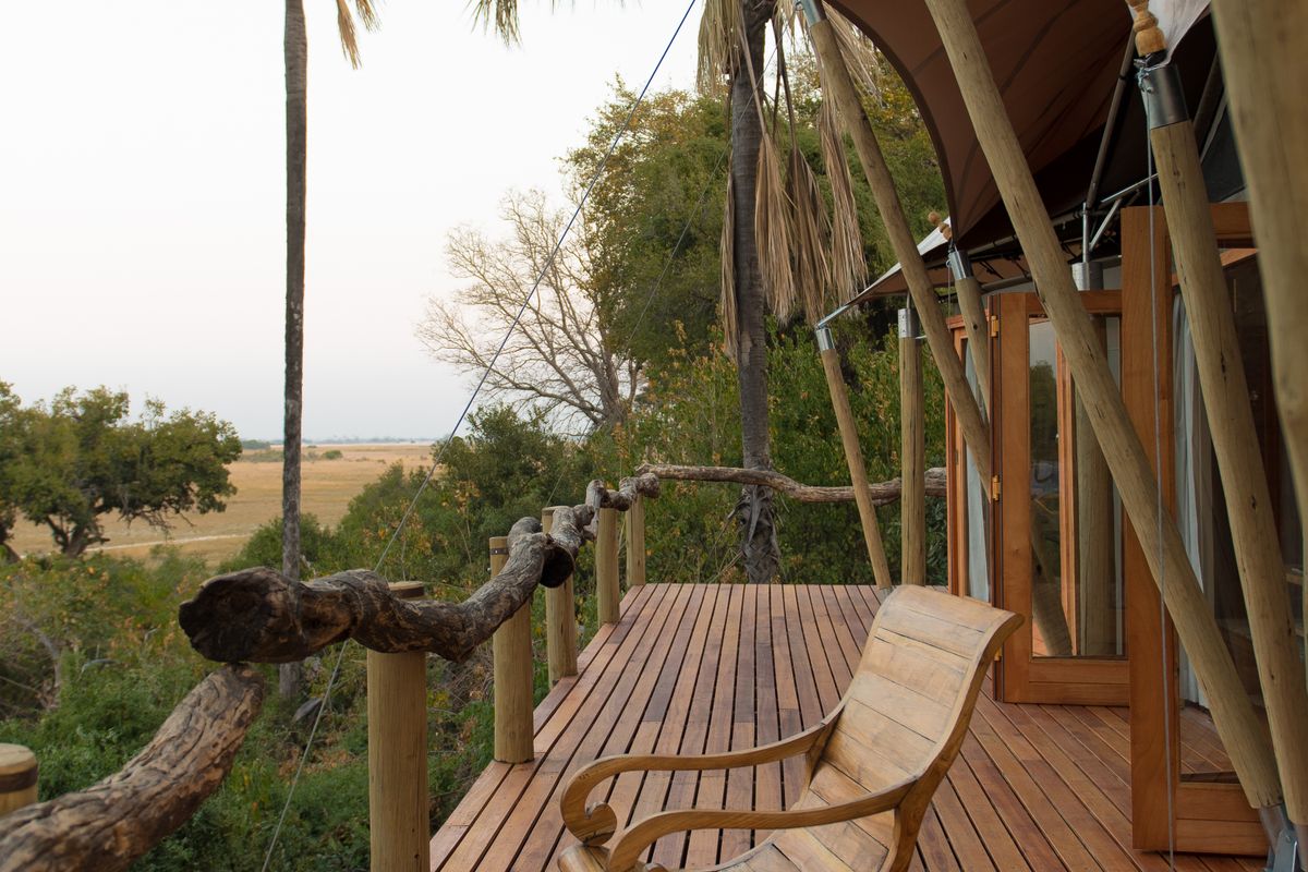 Luxury safari tented camp with a private veranda overlooking the plains