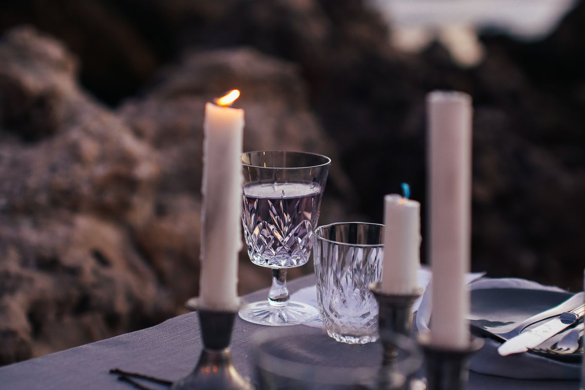 Romantic candle-lit bush dinner on a Kenya honeymoon safari